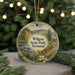 A round ornament with a scenic image of Wilgus State Park, Vermont, featuring a mountain landscape, pine trees, and a river.