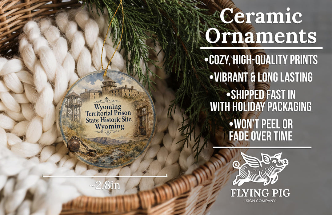 Ceramic ornaments, featuring a Wyoming Territorial Prison State Historic Site ornament, are displayed in a wicker basket.