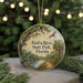 A circular ornament with a scenic image of the Alafia River State Park in Florida, featuring a bird, palm trees, and a path along the river.