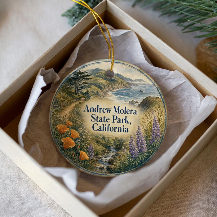 A round ornament with a scenic landscape of Andrew Molesara State Park, California, featuring a winding path, flowers, and a body of water.