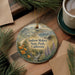 A decorative ornament featuring a scenic landscape of Andrew Moles Park in California, with pine branches and pine needles surrounding it.