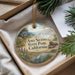 A decorative ornament with a scenic landscape of Ano Nuevo State Park, California, featuring a bird, a seal, and a body of water.