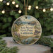 A circular ornament with a scenic landscape of Ano Nuevo State Park, California, featuring a bird, a seal, and a body of water.