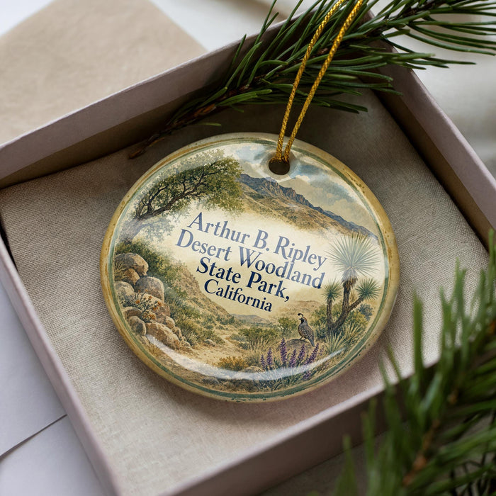 A decorative ornament featuring a scenic landscape of the Arthur B Ripley Desert Woodland State Park in California.