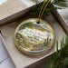 A decorative ornament featuring a scenic landscape of the Arthur B Ripley Desert Woodland State Park in California.