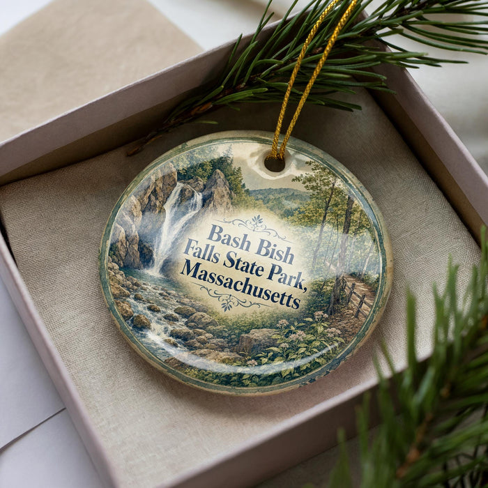 A decorative ornament featuring a scenic image of the falls in Massachusetts, with the text "Bash Falls State Park, Massachusetts" prominently displayed.