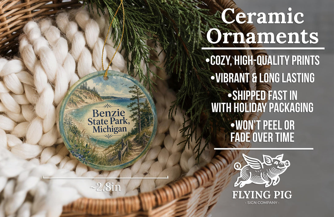 Ceramic ornaments, featuring a scenic image of Benzie State Park, Michigan, hanging from a wicker basket.