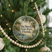 A round ornament hanging on a Christmas tree, featuring a scenic image of Big Shoals State Park in Florida.