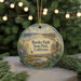 A circular ornament with a scenic landscape of Border Field State Park, California, featuring a beach, mountains, and wildlife.