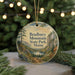 A round ornament with a scenic landscape of Bradbury Mountain State Park, Maine, featuring a lake, mountains, and pine trees.