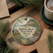 A decorative ornament featuring a scenic image of Buffalo Rock State Park in Illinois, with a small cabin and a lake in the background.