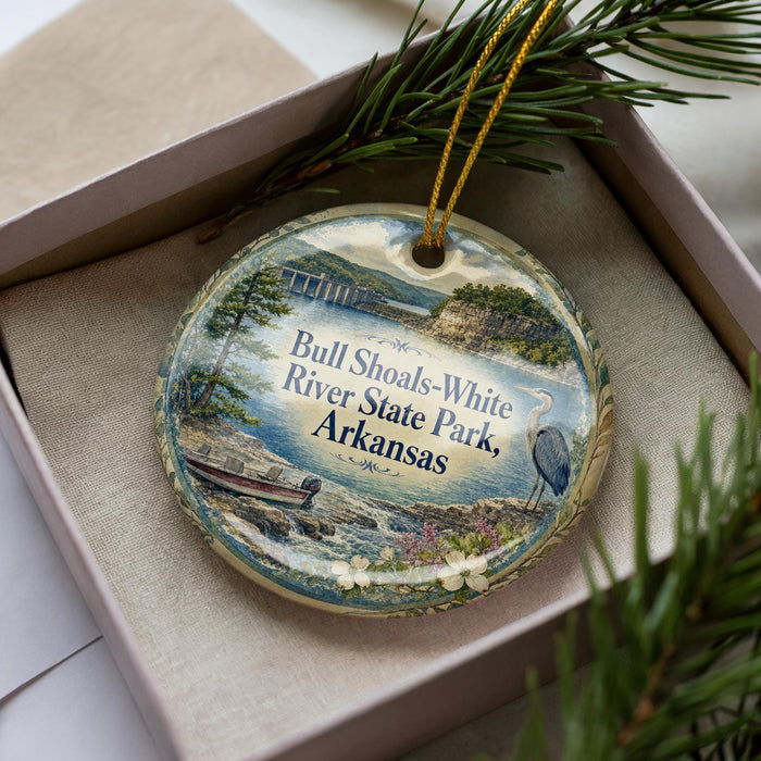 A decorative ornament in a box, featuring a scenic image of the Bull Shoals-White River State Park in Arkansas.