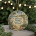 A round ornament with a beach scene and a lighthouse, featuring the text "Caladesi Island State Park, Florida" on it.