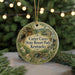 A round ornament with a scenic image of the Carter Caves State Resort Park in Kentucky, featuring a waterfall and a bridge.