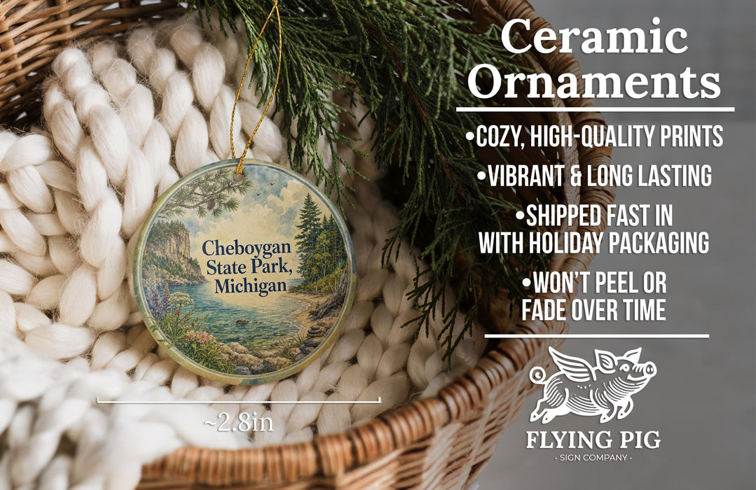 Ceramic ornaments, featuring a scenic landscape of Cheboygan State Park, Michigan, hanging from a wicker basket.