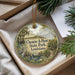 A decorative ornament with a scenic landscape of Chemin-A-Haut State Park in Louisiana, featuring a bird, a pond, and a cabin.