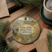 A decorative ornament with a scenic landscape of Chino Hills State Park, California, featuring a winding path, trees, and a bird in flight.