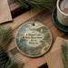 A decorative ornament with a scenic lake and surrounding landscape, featuring text that reads "Clinton Lake State Recreation Area, Illinois".