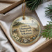 A decorative ornament with a scenic image of Crater of Diamonds State Park in Arkansas, featuring a person digging in the ground and a water tower in the background.