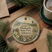 A decorative ornament with a scenic image of Crater of Diamonds State Park, Arkansas, featuring a person, a water tower, and a field with flowers.
