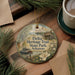 A decorative ornament featuring illustrations of Delta Heritage Trail State Park in Arkansas, with a boat and a house in the background.