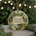 A round ornament with a scenic landscape of Dennis Hill State Park, Connecticut, featuring a waterfall, a tower, and a lake.