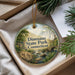 A round ornament with a scenic image of Dinosaur State Park, Connecticut, hanging from a string.