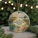 A round ornament featuring a beach scene with a bird, turtle, and palm tree, along with the text "Don Pedro Island State Park, Florida".