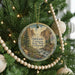A round ornament hanging on a Christmas tree, featuring a scenic image of Eldorado Canyon State Park, Colorado.