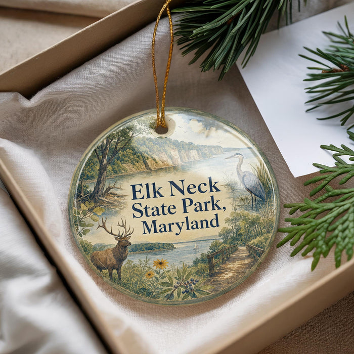 A round ornament with a scenic image of a deer, a bird, and a path in a park, along with the text "Elk Neck State Park, Maryland".