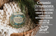 Ceramic ornaments, including a round ornament with a scenic image of Emerald Bay State Park, California, hanging from a wicker basket.