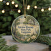 A round ornament with a scenic view of Fairview-Riverside State Park in Louisiana, featuring a bridge, trees, and a bird.