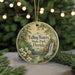A round ornament with a scenic image of Falling Waters State Park in Florida, featuring a waterfall, pine trees, and white flowers.