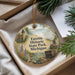 A decorative ornament with a scenic image of Fayette Historic State Park, Michigan, hanging from a string.
