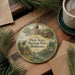 A decorative ornament featuring illustrations of historic buildings and people, with the text "First State Heritage Park, Delaware" prominently displayed.