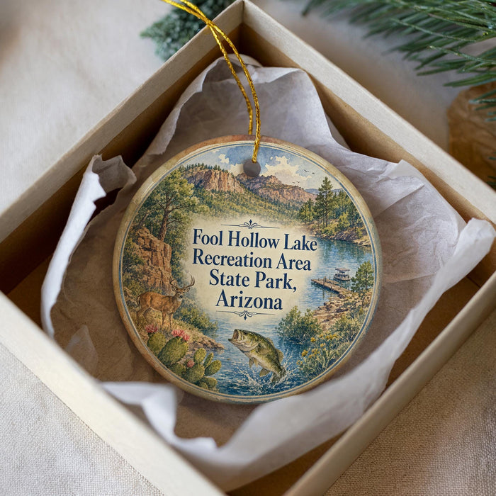 A round ornament with a scenic landscape of Foolhole Lake Recreation Area State Park, Arizona, featuring a fish and surrounded by mountains and water.