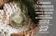 Ceramic ornaments, featuring a round ornament with a scenic landscape and text, are displayed in a woven basket.