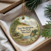 A round ornament with a scenic image of Fort Washington State Park, Maryland, hanging from a string.