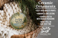 Ceramic ornaments, featuring a design of a scenic view of Fox Point State Park, Delaware, hanging in a wicker basket.
