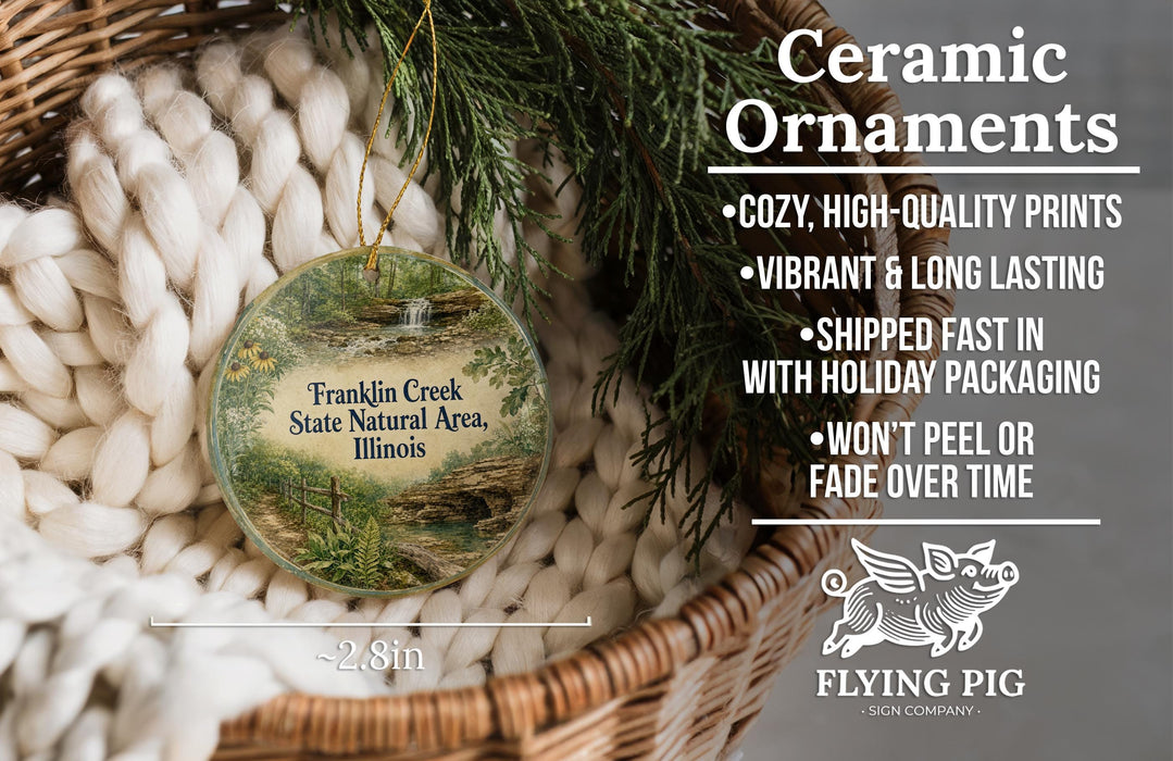 Ceramic ornaments, featuring a detailed image of Franklin Creek Natural Area in Illinois, are displayed in a woven basket.