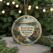 A round ornament with a scenic landscape of Franz Jevne State Park, Minnesota, featuring a cabin and a lake surrounded by pine trees.