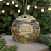A circular ornament featuring a scenic landscape of Garrapata State Park, California, with a bridge and mountains in the background.
