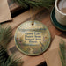 A decorative ornament featuring a bird and a scenic landscape, with text that reads "Goose Lake Prairie State Natural Area, Illinois".