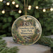 A circular ornament with a scenic image of Gooseberry Falls State Park, Minnesota, hanging from a string.