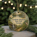 A round ornament with a painting of a forest and a waterfall, featuring the text "Gordonia-Alatamaha State Park, Georgia".