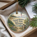 A decorative ornament with a lighthouse and a bird, featuring the text "Grand Haven State Park, Michigan" on a circular background.