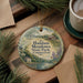 A round ornament with a scenic landscape of Haddam Meadows State Park, Connecticut, featuring a house, trees, and a lake.