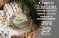 Ceramic ornaments, including a round ornament with a beach scene and a wicker basket with greenery.