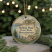 A circular ornament with a scenic illustration of Halibut Point State Park, Massachusetts, hanging from a string.