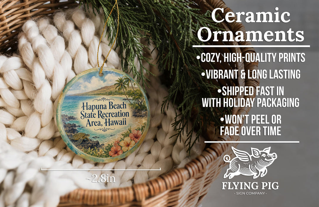 Ceramic ornaments, including a round ornament with a tropical beach scene, are displayed in a woven basket.